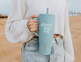 On the go, at work or outdoors—custom tumblers, mugs, bottles and coolers.