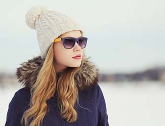 Stylish person wearing a winter hat